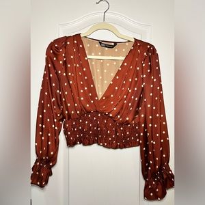 Polka dot, deep red cropped long sleeve shirt. Great lightweight top!